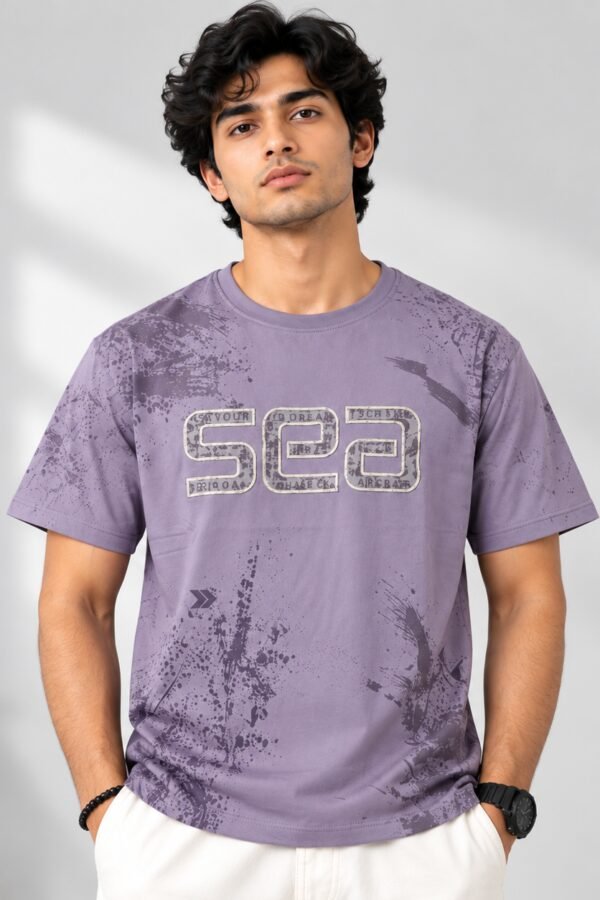 Purple splatter-print oversized t-shirt with SEA graphic typography, streetwear tee by Arshmee Fashion