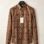 Premium brown printed shirt fabric with geometric pattern and detailed texture