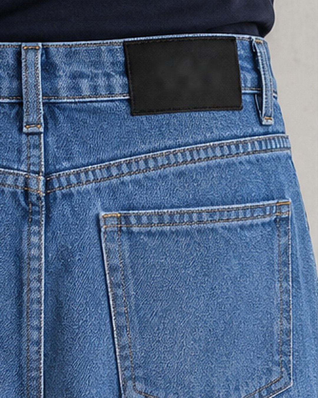 Back pocket close-up of light blue wide leg jeans for men – Arshmee Fashion