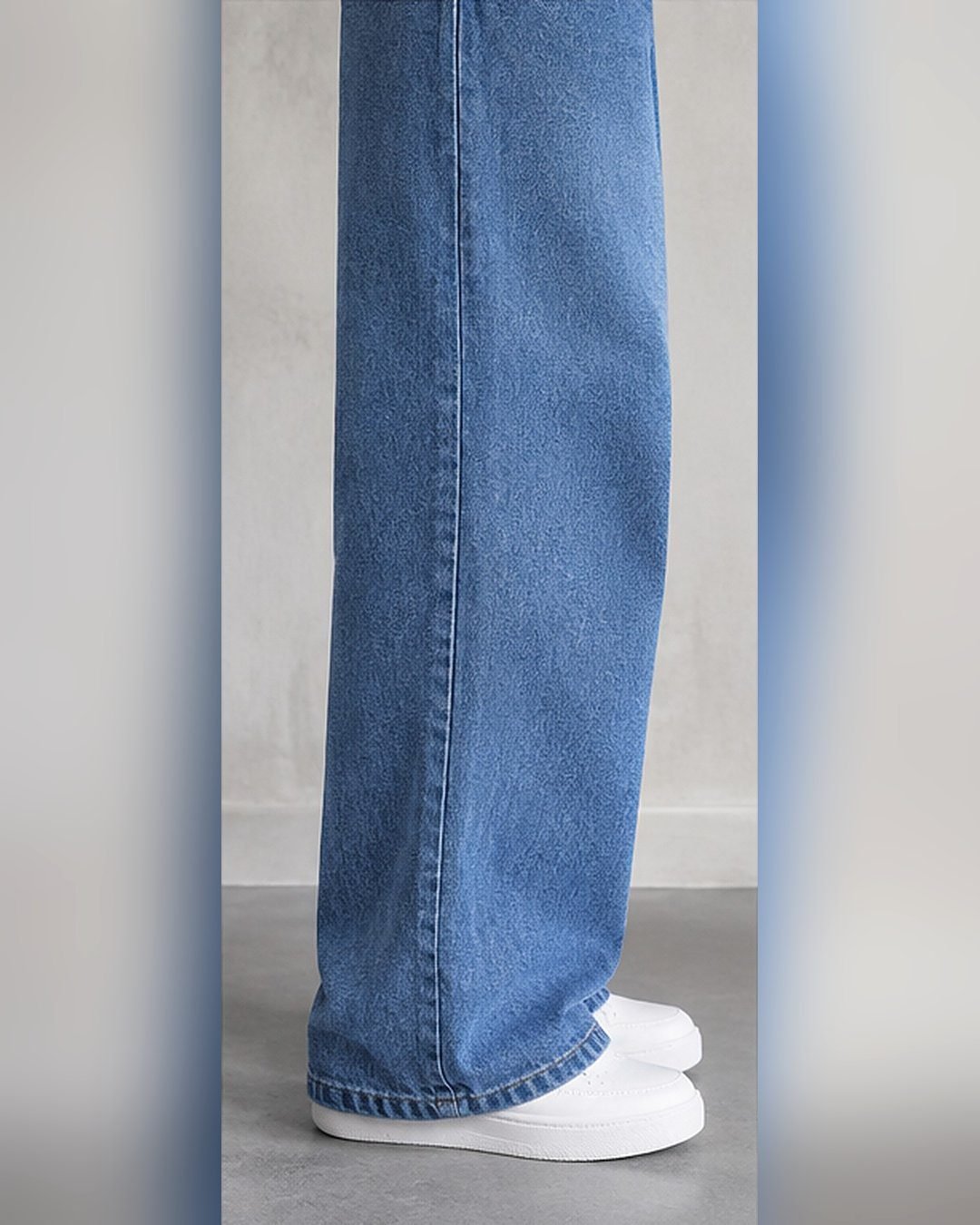Side view of light blue wide leg jeans over white sneakers – Arshmee Fashion